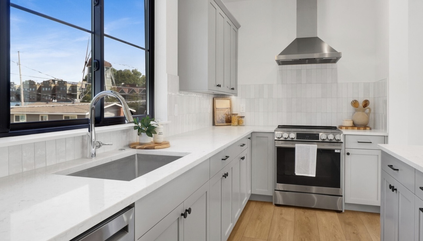 Quartz kitchen with stainless steel appliances